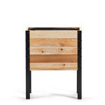 Wooden planter box with black metal frame on a white background