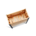 Wooden crate with metal legs on a white background