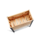 Wooden crate with metal legs on a white background