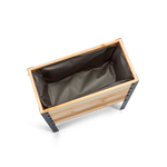 Wooden planter box with a dark interior on a white background