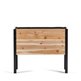 Wooden planter box with black metal frame on a white background