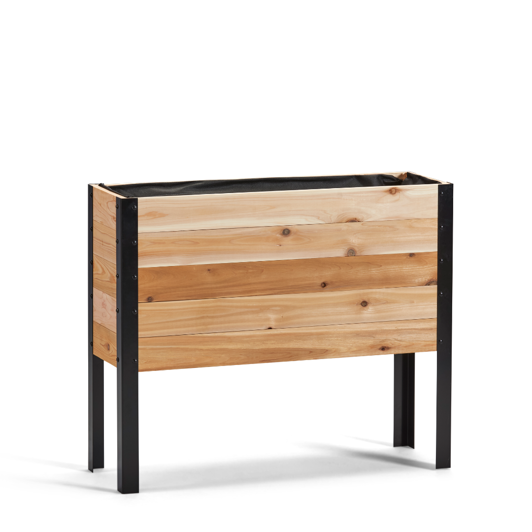 Wooden planter box with black metal legs on a white background