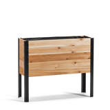 Wooden planter box with black metal legs on a white background