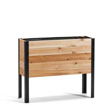 Wooden planter box with black metal legs on a white background