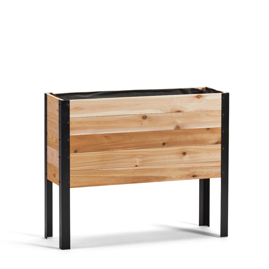 Wooden planter box with black metal legs on a white background