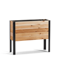 Wooden planter box with black metal legs on a white background