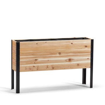 Wooden planter box with black metal legs on a white background