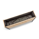 Wooden planter box with black interior on a white background