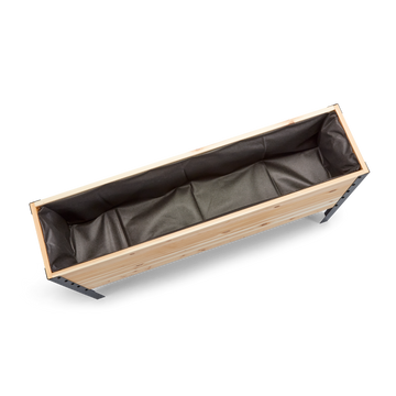 Wooden planter box with black interior on a white background