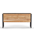Wooden planter box with black metal frame on a white background