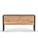 Wooden planter box with black metal frame on a white background
