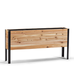 Wooden planter box with black metal frame on a white background