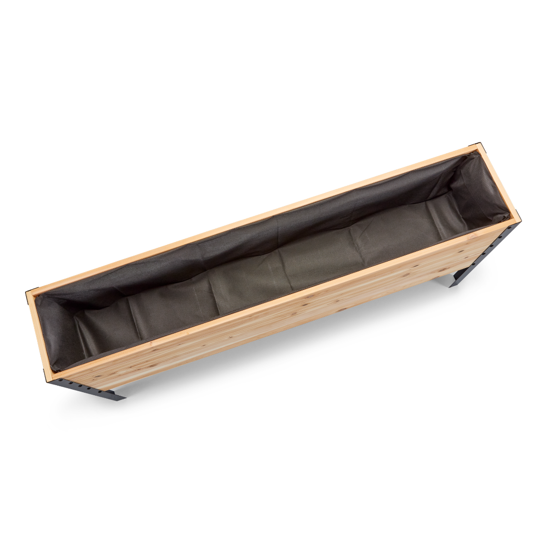 Rectangular planter with wooden frame and black liner on a white background