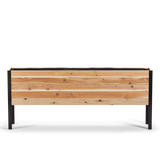Wooden planter box with black metal frame on a white background