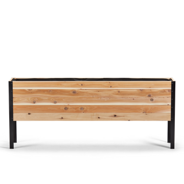 Wooden planter box with black metal frame on a white background