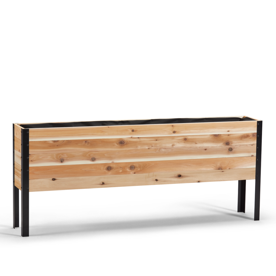 Wooden planter box with black metal frame on a white background